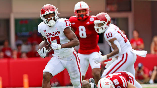 Sep 17, 2022; Lincoln, Nebraska, USA;  Oklahoma Sooners wide receiver Marvin Mims (17) runs with the ball during the first half against the Nebraska Cornhuskers at Memorial Stadium.