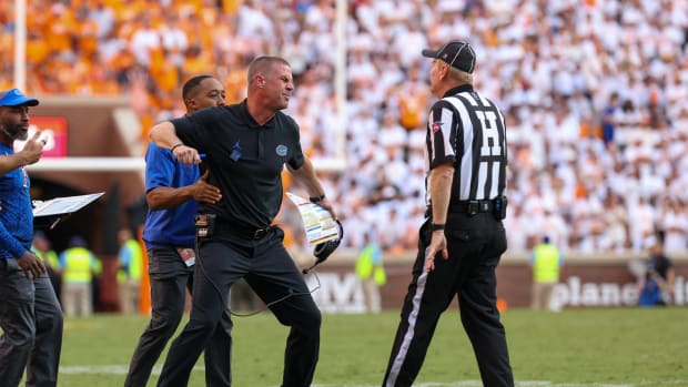 Sep 24, 2022; Knoxville, Tennessee, USA; Florida Gators head coach Billy Napier argues with an official during the second half against the Tennessee Volunteers at Neyland Stadium.