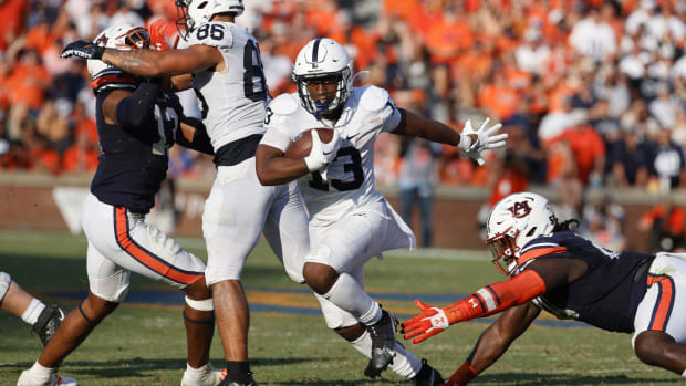 Sep 17, 2022; Auburn, Alabama, USA; Penn State Nittany Lions running back Kaytron Allen (13) avoids a tackle by the Auburn Tigers during the third quarter at Jordan-Hare Stadium.