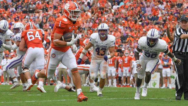 Sep 10, 2022; Clemson, South Carolina, USA; Clemson Tigers running back Will Shipley (1) runs 17 yards for a touchdown against Furman Paladins safety Jalen Miller (36) during the second quarter at Memorial Stadium.