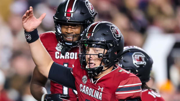 Nov 19, 2022; Columbia, South Carolina, USA; South Carolina Gamecocks quarterback Spencer Rattler (7) celebrates after a touchdown against the Tennessee Volunteers in the second half at Williams-Brice Stadium.