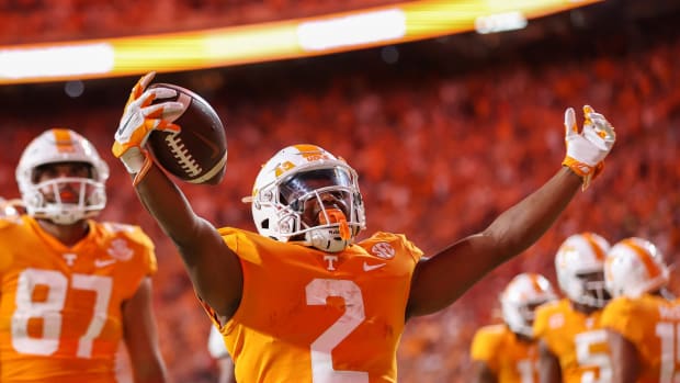 Sep 1, 2022; Knoxville, Tennessee, USA; Tennessee Volunteers running back Jabari Small (2) celebrates after running for a touchdown against the Ball State Cardinals during the first half at Neyland Stadium. Mandatory Credit: Randy Sartin-USA TODAY Sports