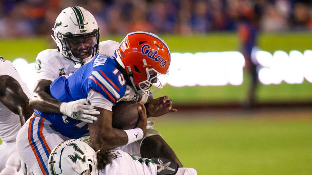 Florida Gators quarterback Anthony Richardson (15) is brought down in the second half against the Bulls at Steve Spurrier Field at Ben Hill Griffin Stadium in Gainesville, FL on Saturday, September 17, 2022. Florida won 31-28