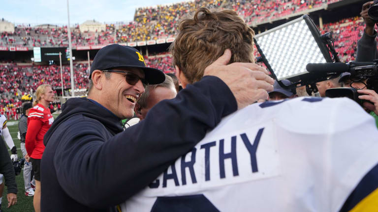 Jim Harbaugh stays in Michigan