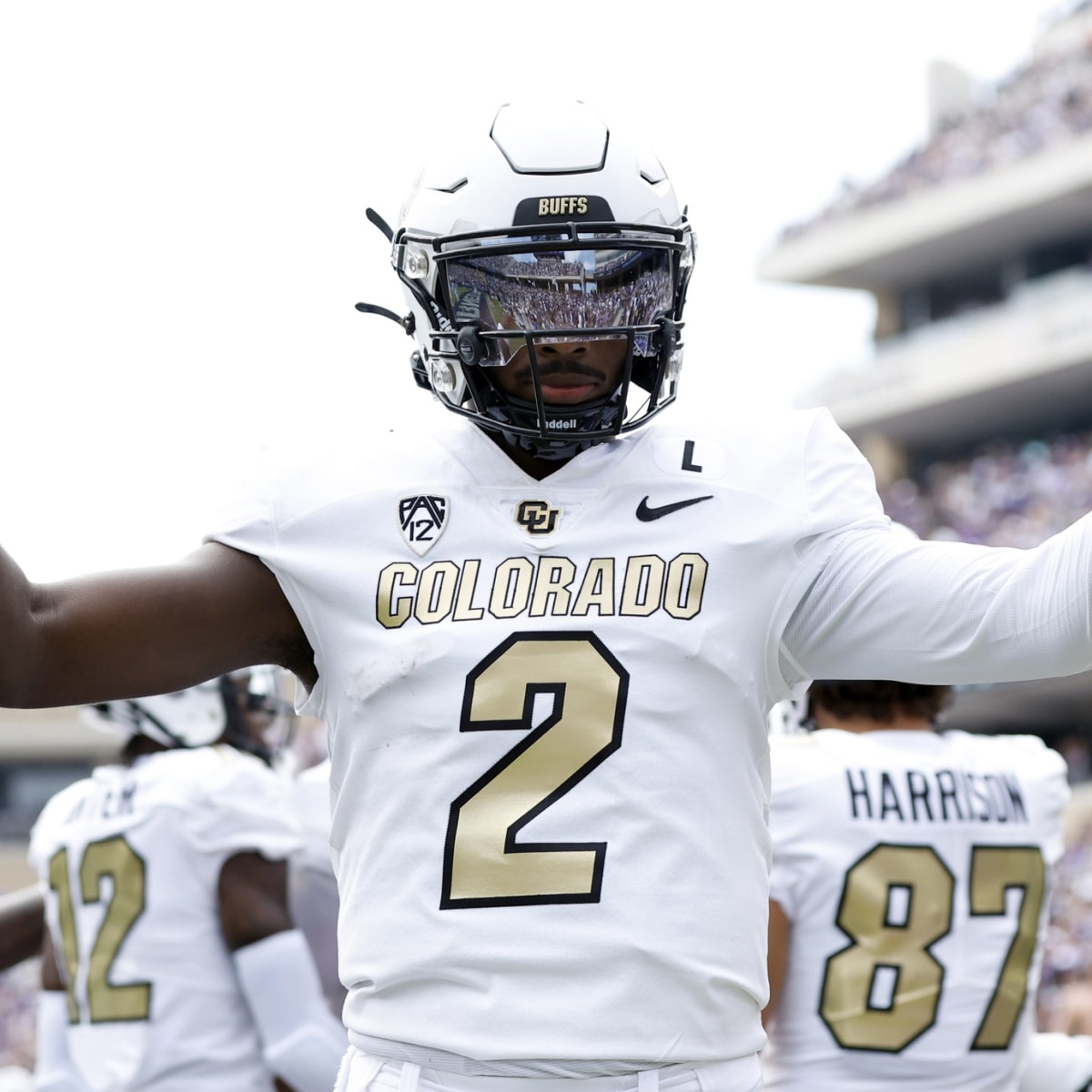 Coach Prime debuts new white and gold uniforms in Colorado debut