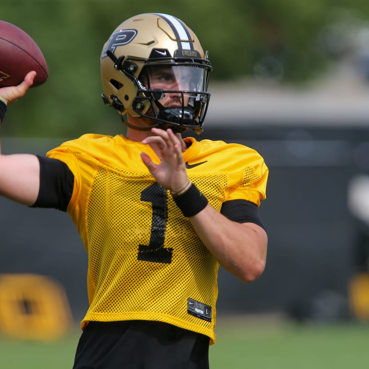 Purdue football uniforms through the years in photos