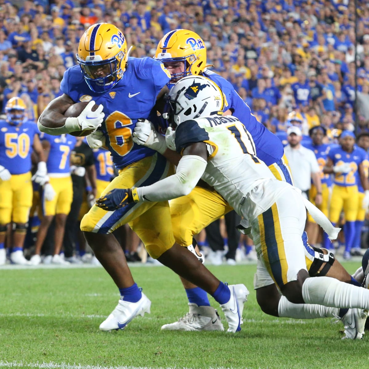 Devonshire's late Pick 6 lifts No. 17 Pitt over WVU, 38-31