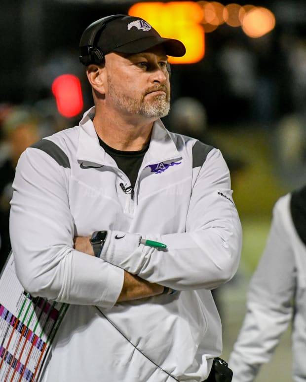 Lipscomb Academy coach Trent Dilfer leads his team during a game against CPA at CPA in Nashville on Friday, Oct. 21.