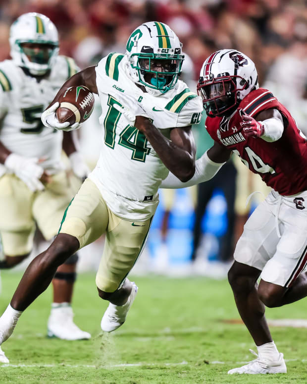 Sep 24, 2022; Columbia, South Carolina, USA; Charlotte 49ers wide receiver Grant DuBose (14) rushes past South Carolina Gamecocks defensive back Marcellas Dial (24) in the second quarter at Williams-Brice Stadium.