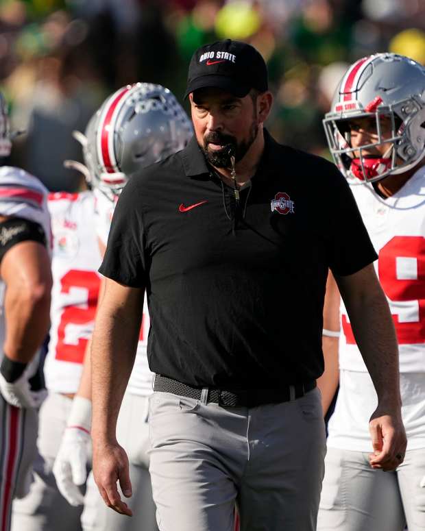 Ohio State Buckeyes head coach Ryan Day leads warm ups prior to the College Football Playoff quarterfinal against the Oregon Ducks at the Rose Bowl in Pasadena, Calif. on Jan. 1, 2025.