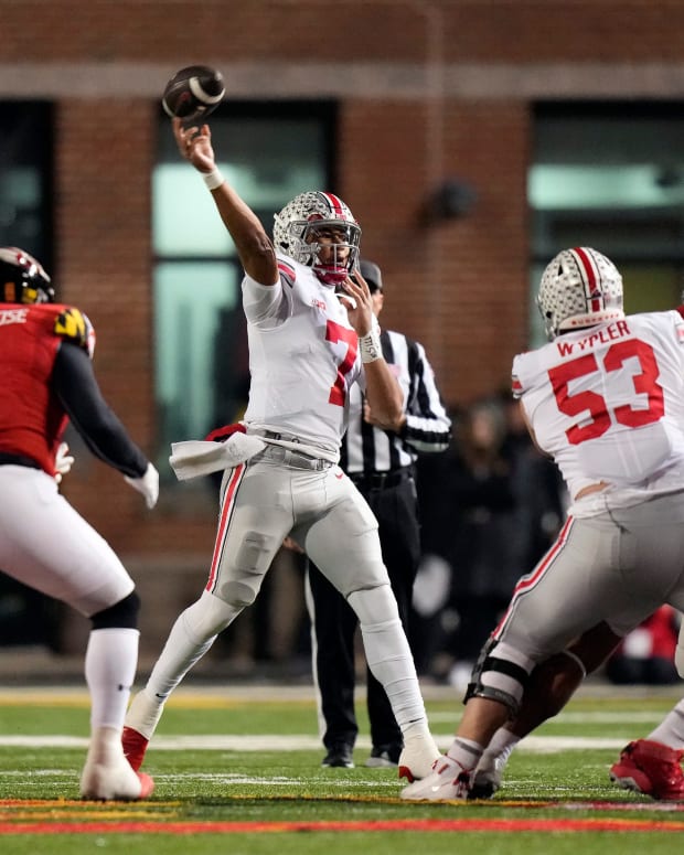 Nov 19, 2022; College Park, MD, USA; Ohio State Buckeyes quarterback C.J. Stroud (7) throws the ball against Maryland Terrapins in the third quarter in their Big Ten game at SECU Stadium.