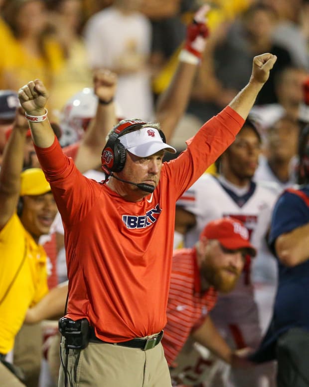 Sep 3, 2022; Hattiesburg, Mississippi, USA; Liberty Flames head coach Hugh Freeze gestures after his team stopped the Southern Miss Golden Eagles on the goal line in overtime to win the game at M.M. Roberts Stadium. Liberty won in overtime, 29-27.