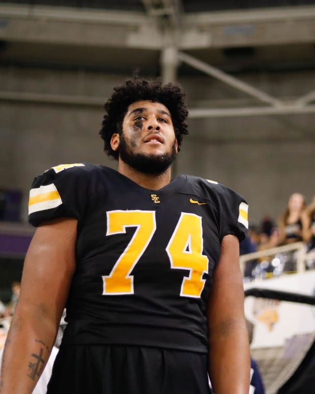 Southeast Polk lineman Kadyn Proctor (74) takes in the final seconds of the Class 5A playoff championships on Friday, Nov. 18, 2022, at the UNI-Dome in Cedar Falls.