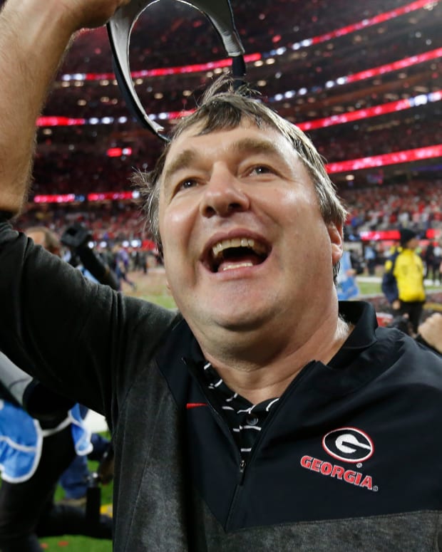 Georgia coach Kirby Smart celebrates with fans after the NCAA College Football National Championship game between TCU and Georgia on Monday, Jan. 9, 2023, in Inglewood, Calif. Georgia won 65-7.