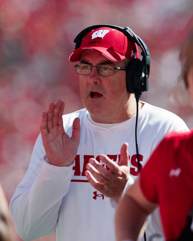 Oct 1, 2022; Madison, Wisconsin, USA; Wisconsin Badgers head coach Paul Chryst encourages his team during the third quarter against the Illinois Fighting Illini at Camp Randall Stadium.