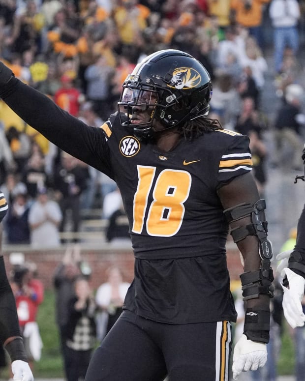 Oct 1, 2022; Columbia, Missouri, USA; Missouri Tigers defensive lineman Trajan Jeffcoat (18) celebrates after a sack against the Georgia Bulldogs during the first half at Faurot Field at Memorial Stadium.