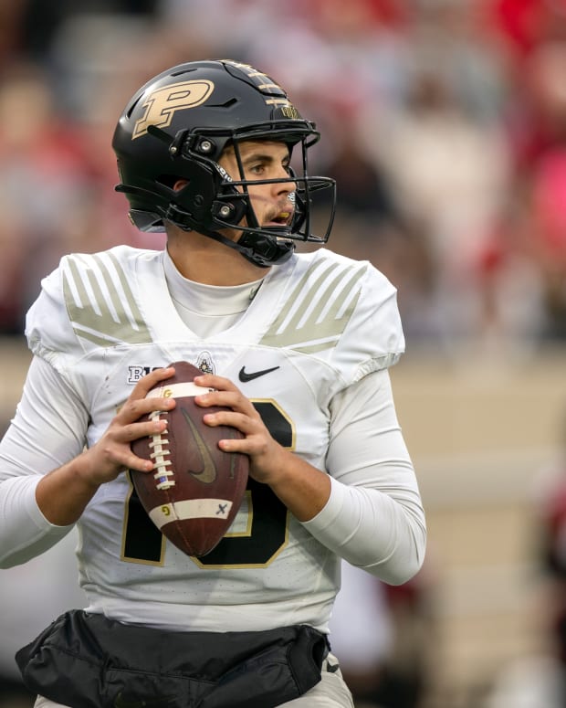 Nov 26, 2022; Bloomington, Indiana, USA; Purdue Boilermakers quarterback Aidan O'Connell (16) looks to pass the ball during the first quarter against the Indiana Hoosiers at Memorial Stadium.