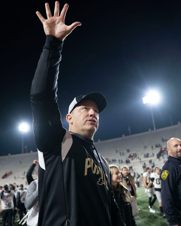 Nov 26, 2022; Bloomington, Indiana, USA; Purdue Boilermakers head coach Jeff Brohm waves toward the fan section after winning the game against the Indiana Hoosiers at Memorial Stadium.