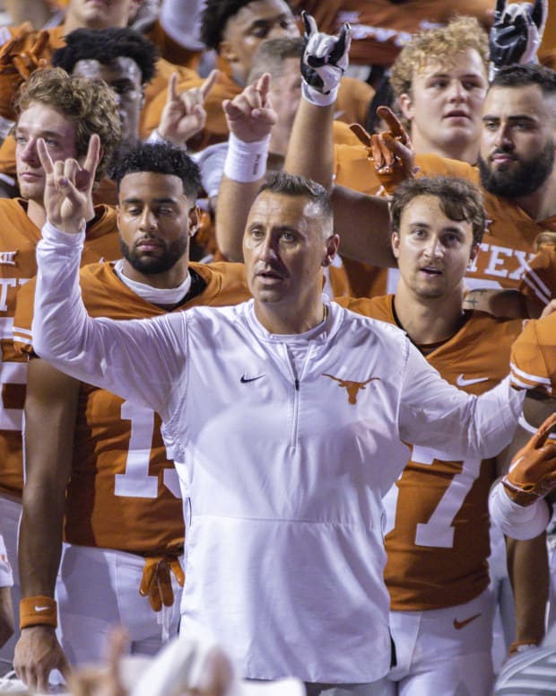 Sep 17, 2022; Austin, Texas, USA; Texas Longhorns head coach Steve Sarkisian gathers with his players for the Eyes of Texas school song after defeating the UTSA Roadrunners at Darrell K Royal-Texas Memorial Stadium.