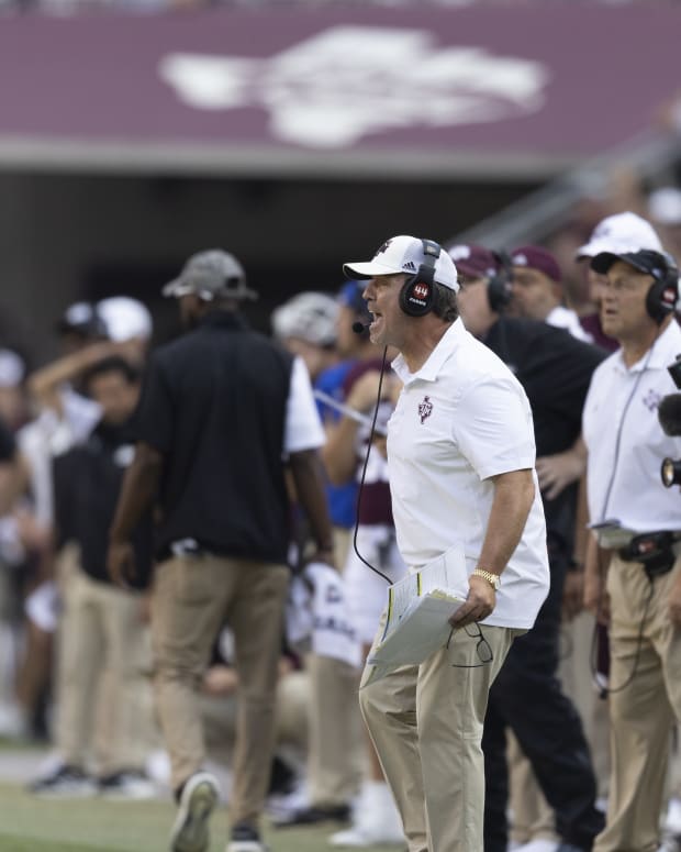 Sep 10, 2022; College Station, Texas, USA; Texas A&M Aggies head coach Jimbo Fisher yells as they play against the Appalachian State Mountaineers in the fourth quarter at Kyle Field. Appalachian State Mountaineers won 17 to 14.