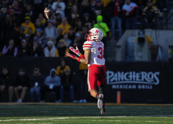 Nebraska wide receiver Trey Palmer (3) pulls down a pass reception for a touchdown in the first quarter against Iowa during a NCAA football game on Friday, Nov. 25, 2022, at Kinnick Stadium in Iowa City.