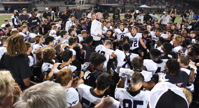 Aug 27, 2022; Alabaster, AL, USA; Lipscomb Academy head coach Trent Dilfer talks to players from both teams after the game at Thompson High School in Alabaster, Ala., Saturday, Aug. 27, 2022. Lipscomb Academy defeated Thompson 24-14.