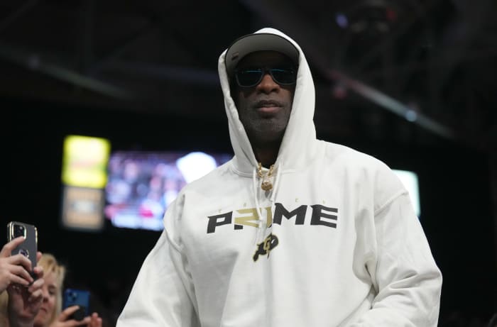 Dec 8, 2022; Boulder, Colorado, USA; Colorado Buffaloes head coach Deion Sanders enters the Coors Events Center before the start of the second half against the Colorado State Rams.