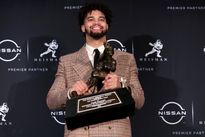 Dec 10, 2022; New York, NY, USA; Southern California quarterback Caleb Williams poses for photos during a press conference in the Astor Ballroom at the New York Marriott Marquis in New York, NY, after winning the 2022 Heisman Trophy.