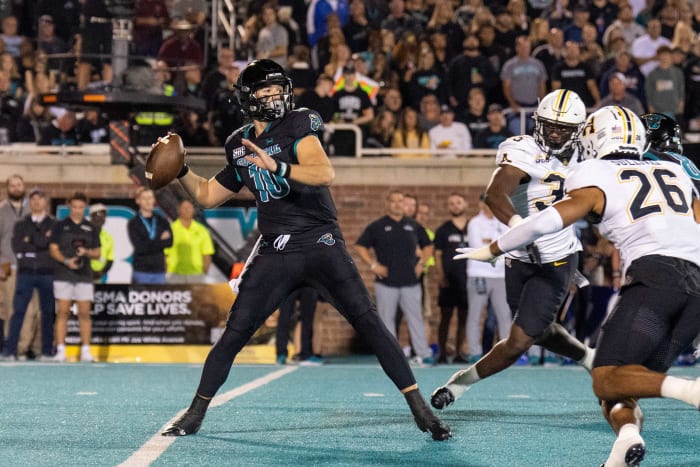 Nov 3, 2022; Conway, South Carolina, USA; Coastal Carolina Chanticleers quarterback Grayson McCall (10) throws a pass in the first half against the Appalachian State Mountaineers at Brooks Stadium.