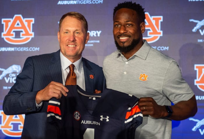 Auburn Tigers football coach Hugh Freeze poses with associate head coach Cadillac Williams at the Woltosz Football Performance Center in Auburn, Ala., on Tuesday, Nov. 29, 2022