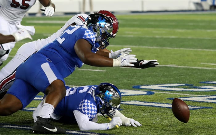 Kentucky s Justin Rogers goes for the fumble against South Carolina.Oct. 8, 2022