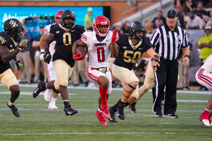 Sep 17, 2022; Winston-Salem, North Carolina, USA; Liberty Flames running back Dae Dae Hunter (0) scores on his touchdown run against the Wake Forest Demon Deacons during the second half at Truist Field.