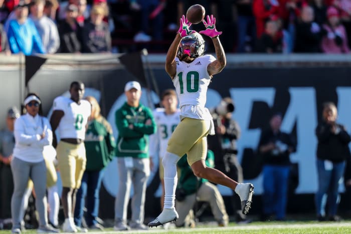 Oct 8, 2022; Cincinnati, Ohio, USA; South Florida Bulls wide receiver Xavier Weaver (10) catches a pass against the Cincinnati Bearcats in the second half at Nippert Stadium