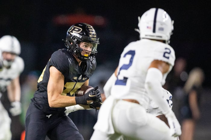 Sep 1, 2022; West Lafayette, Indiana, USA; Purdue Boilermakers wide receiver Charlie Jones (15) runs with the ball in the second half against the Penn State Nittany Lions at Ross-Ade Stadium. Mandatory Credit: Trevor Ruszkowski-USA TODAY Sports