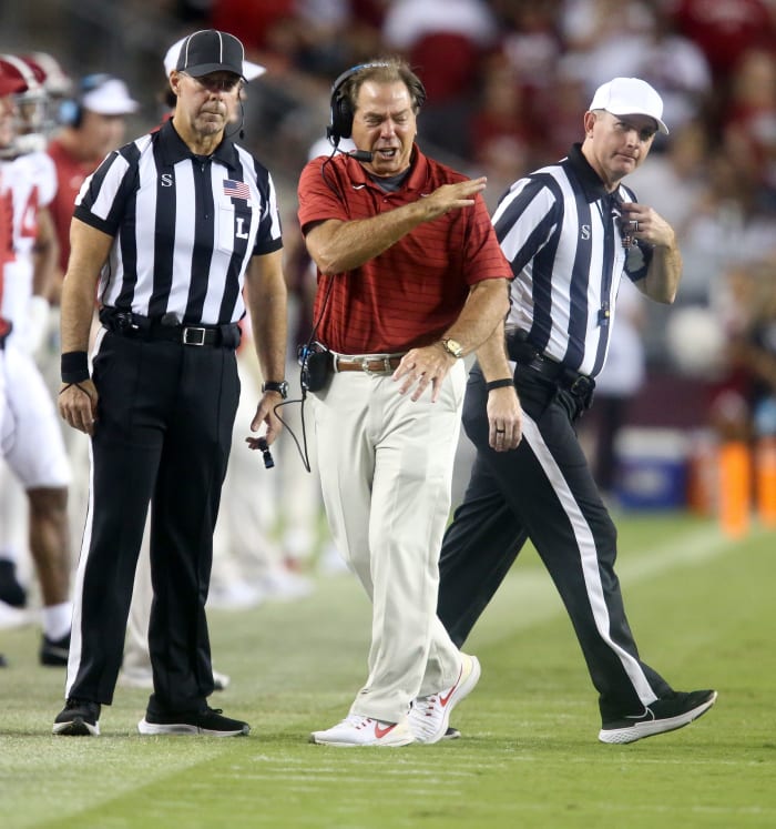 Oct 9, 2021; College Station, Texas, USA; Alabama Head Coach Nick Saban disputes a call by an official during Alabama's game with Texas A&M at Kyle Field. Texas A&M defeated Alabama 41-38 on a field goal as time expired. Mandatory Credit: Gary Cosby Jr.-USA TODAY Sports