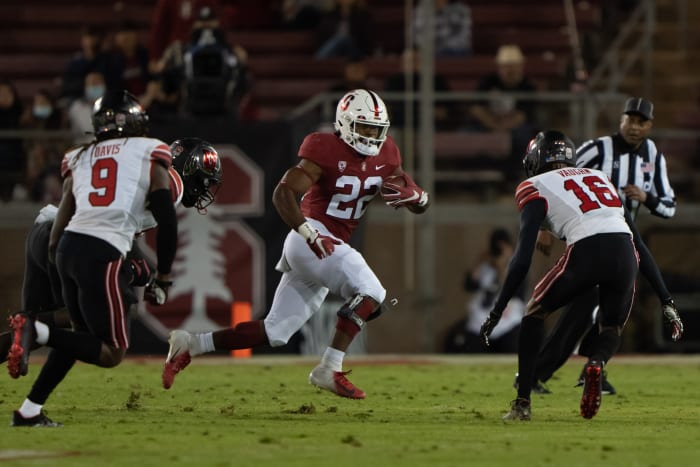 Nov 5, 2021; Stanford, California, USA; Stanford Cardinal running back E.J. Smith (22) runs with the football during the first quarter against the Utah Utes at Stanford Stadium.