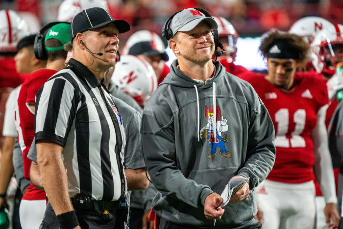 Sep 10, 2022; Lincoln, Nebraska, USA; Nebraska Cornhuskers head coach Scott Frost (right) smiles while watching a review of a touchdown against the Georgia Southern Eagles during the fourth quarter at Memorial Stadium.