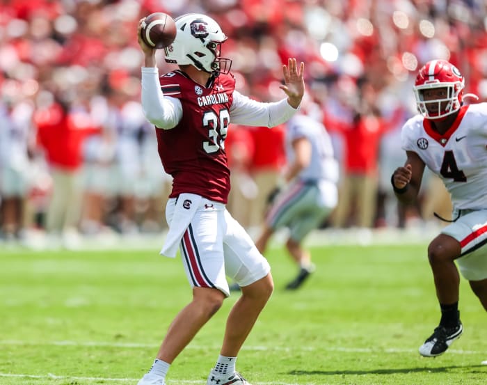 Sep 17, 2022; Columbia, South Carolina, USA; South Carolina Gamecocks punter Kai Kroeger (39) passes for a first down on a fake punt against the Georgia Bulldogs in the second quarter at Williams-Brice Stadium.