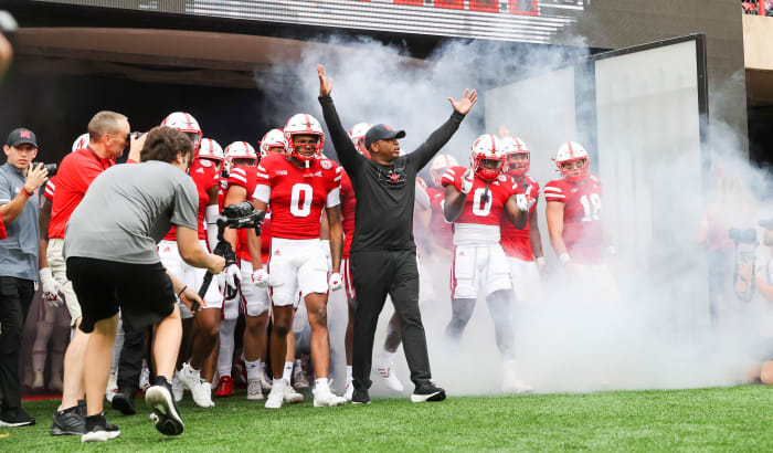 Sep 17, 2022; Lincoln, Nebraska, USA; Nebraska Cornhuskers interim head coach Mickey Joseph leads his team out of the tunnel before the game against the Oklahoma Sooners at Memorial Stadium.