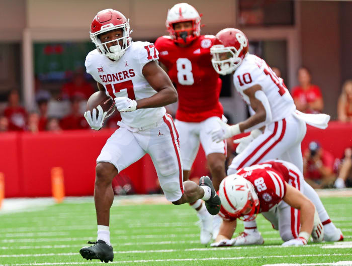 Sep 17, 2022; Lincoln, Nebraska, USA; Oklahoma Sooners wide receiver Marvin Mims (17) runs with the ball during the first half against the Nebraska Cornhuskers at Memorial Stadium.