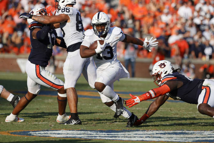 Sep 17, 2022; Auburn, Alabama, USA; Penn State Nittany Lions running back Kaytron Allen (13) avoids a tackle by the Auburn Tigers during the third quarter at Jordan-Hare Stadium.