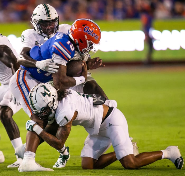 Florida Gators quarterback Anthony Richardson (15) is brought down in the second half against the Bulls at Steve Spurrier Field at Ben Hill Griffin Stadium in Gainesville, FL on Saturday, September 17, 2022. Florida won 31-28