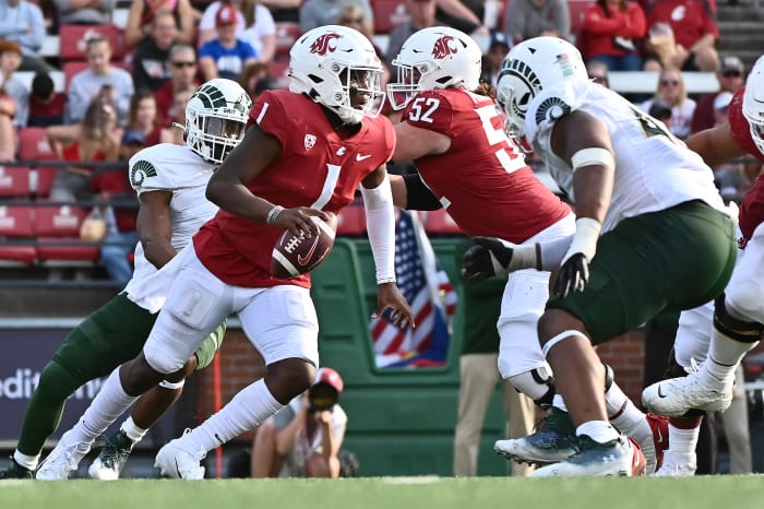 Sep 17, 2022; Pullman, Washington, USA; Washington State Cougars quarterback Cameron Ward (1) scrambles out of the pocket against the Colorado State Rams in the second half at Gesa Field at Martin Stadium.