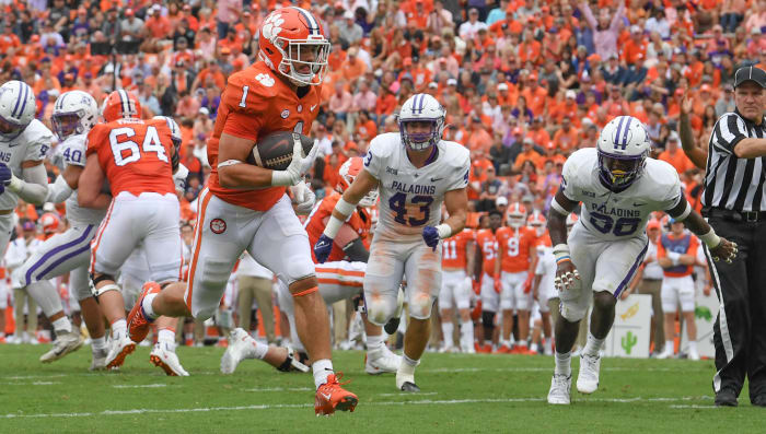 Sep 10, 2022; Clemson, South Carolina, USA; Clemson Tigers running back Will Shipley (1) runs 17 yards for a touchdown against Furman Paladins safety Jalen Miller (36) during the second quarter at Memorial Stadium.