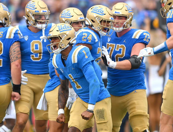 Sep 17, 2022; Pasadena, California, USA; UCLA Bruins quarterback Dorian Thompson-Robinson (1) celebrates with running back Zach Charbonnet (24) in the end zone but the touchdown was reversed after a review of the next play in the first half South Alabama Jaguars at the Rose Bowl.