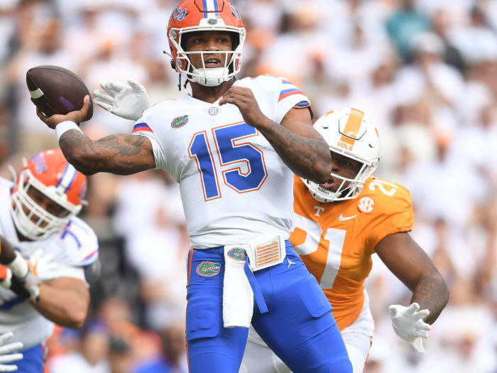 Florida quarterback Anthony Richardson (15) pulls back to throw as Tennessee defensive lineman Omari Thomas (21) approaches during the NCAA college football game on Saturday, September 24, 2022 in Knoxville, Tenn.