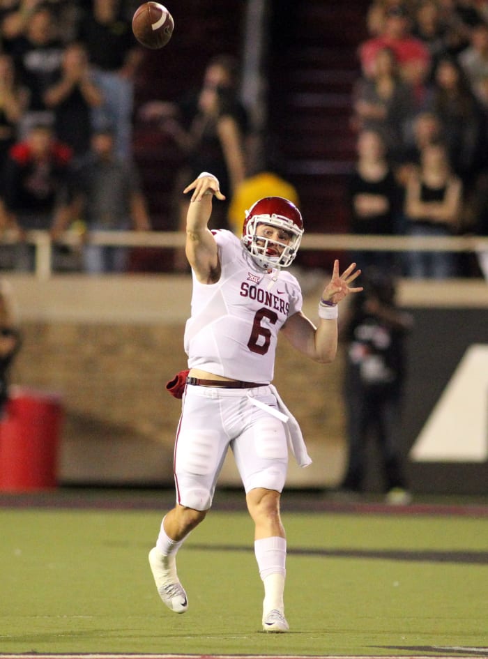 Oct 22, 2016; Lubbock, TX, USA; Oklahoma Sooners quarterback Baker Mayfield (6) passes against the Texas Tech Red Raiders in the first half at Jones AT&T Stadium.