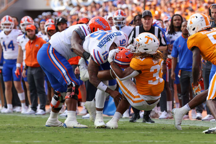 Sep 24, 2022; Knoxville, Tennessee, USA; Florida Gators quarterback Anthony Richardson (15) is tackled by Tennessee Volunteers linebacker Jeremy Banks (33) during the second half at Neyland Stadium.