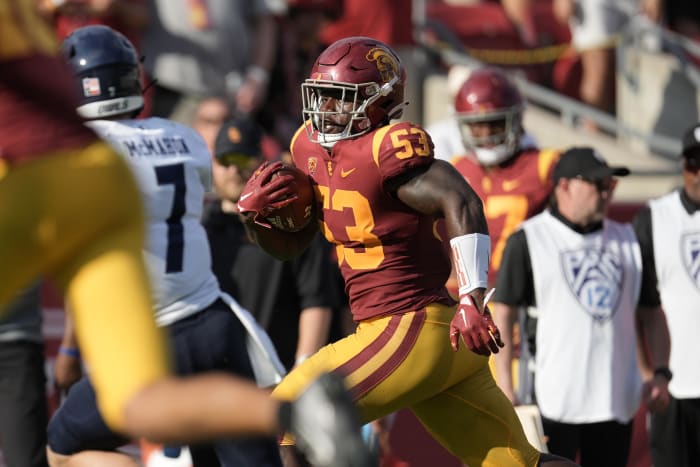 Sep 3, 2022; Los Angeles, California, USA; Southern California Trojans linebacker Shane Lee (53) scores a touchdown on an interception return against the Rice Owls in the second half at United Airlines Field at Los Angeles Memorial Coliseum.