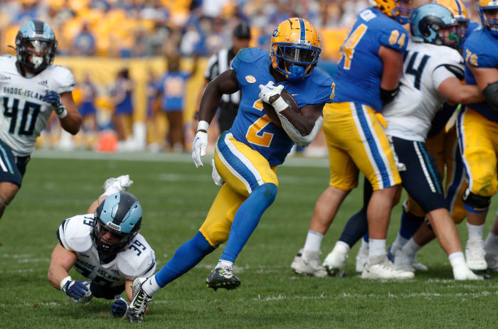 Sep 24, 2022; Pittsburgh, Pennsylvania, USA; Pittsburgh Panthers running back Israel Abanikanda (2) runs on his way to scoring a twenty-four yard touchdown against the Rhode Island Rams during the third quarter at Acrisure Stadium.